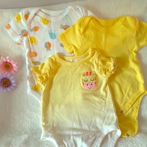 Set of 3 items. Three bodysuits.